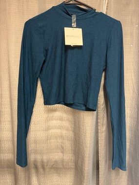 NWT!! Beyond Yoga Teal Featherweight Moving On Cropped Pullover in Blue Gem!